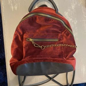 Maroon velvet backpack